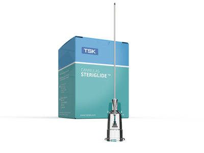 Front view of TSK STERiGLIDE 27G x 38mm Aesthetic Cannula box with unpacked cannula in front: blunt dome tip, depth markings, introducer needle visible, box of 20
