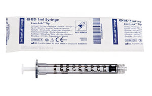 Individual sterile blister package of BD 309628 1mL Luer-Lok Syringe beside unpacked syringe: clear barrel, bold 0.01mL graduations, secure Luer-Lok tip visible